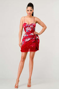 Red kimono-inspired floral print mini dress with playful tassel hem detail by Rêve Dorés