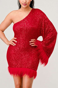 Azure Allure One-Shoulder Dress Model wearing a glamorous one-shoulder mini dress in vibrant red, adorned with shimmering sequins and featuring a dramatic single sleeve. The hem and sleeve are accented with feathered detailing, adding a bold and luxurious touch, perfect for special occasions or holiday parties. - Rêve Dorés