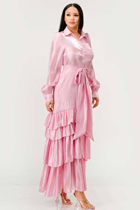 Elegant Pink Ruffled Maxi Dress: This elegant pink maxi dress is designed with tiered ruffles on the skirt, long puff sleeves, and a collared neckline. The dress includes a fabric belt to cinch the waist. Rêve Dorés