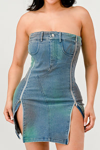 Model wearing a strapless denim mini dress featuring a structured bust design, zipper accents on both sides creating adjustable slits, and subtle distressed details for a chic and edgy look - Rêves dorés