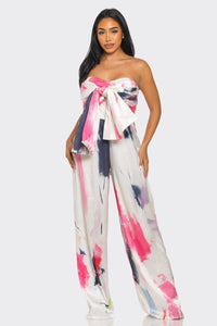 Elegant and stylish wide-leg jumpsuit featuring a bold, colorful abstract pattern
Rêve Dorés